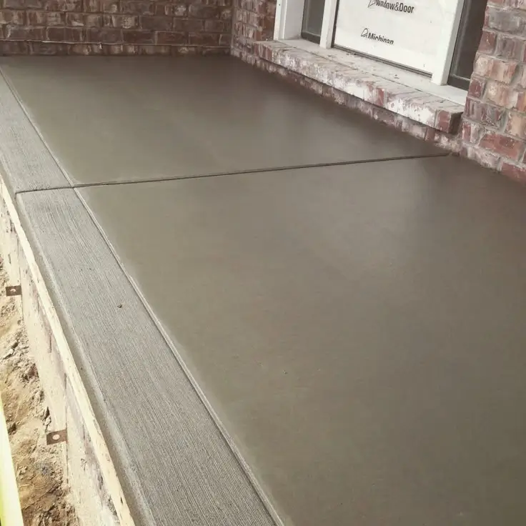A durable, well-crafted concrete patios by Northland Concrete Services, providing a sturdy foundation for backyard relaxation.