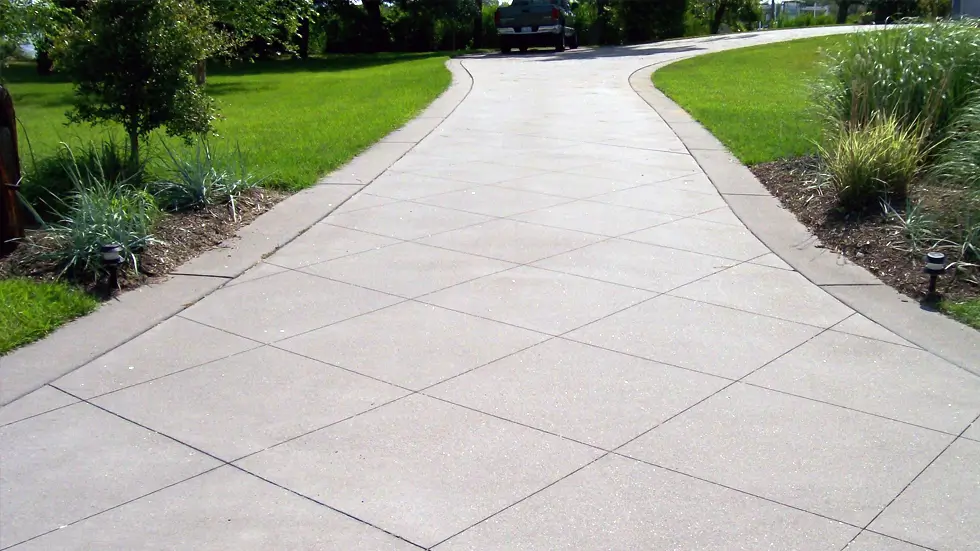 A newly constructed concrete driveways by Northland Concrete Services, designed for durability and a smooth finish.