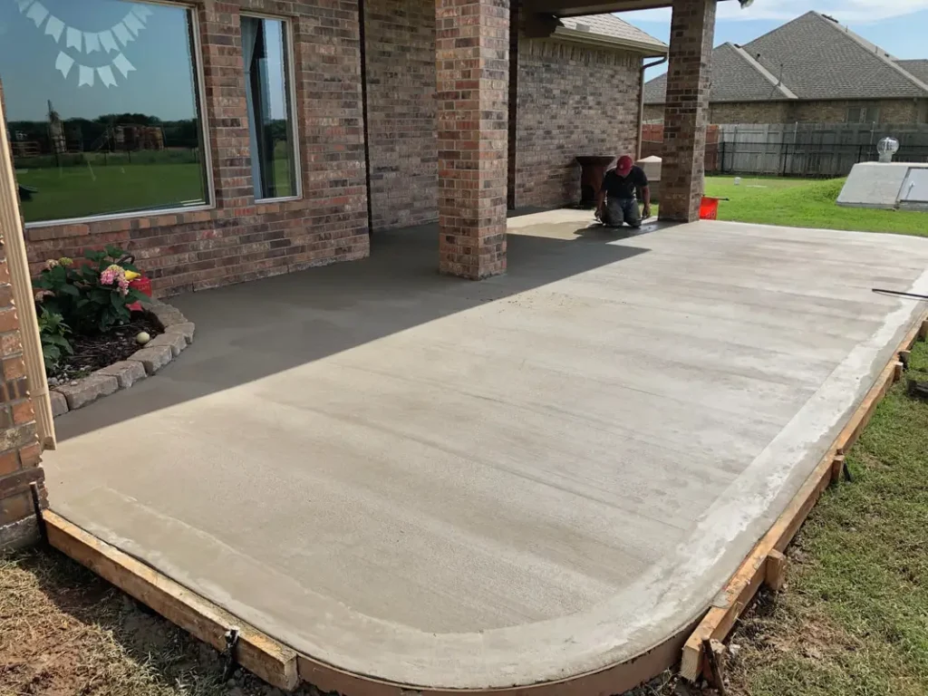 A spacious concrete patios installation by Northland Concrete Services, enhancing the backyard with a sleek and modern design.