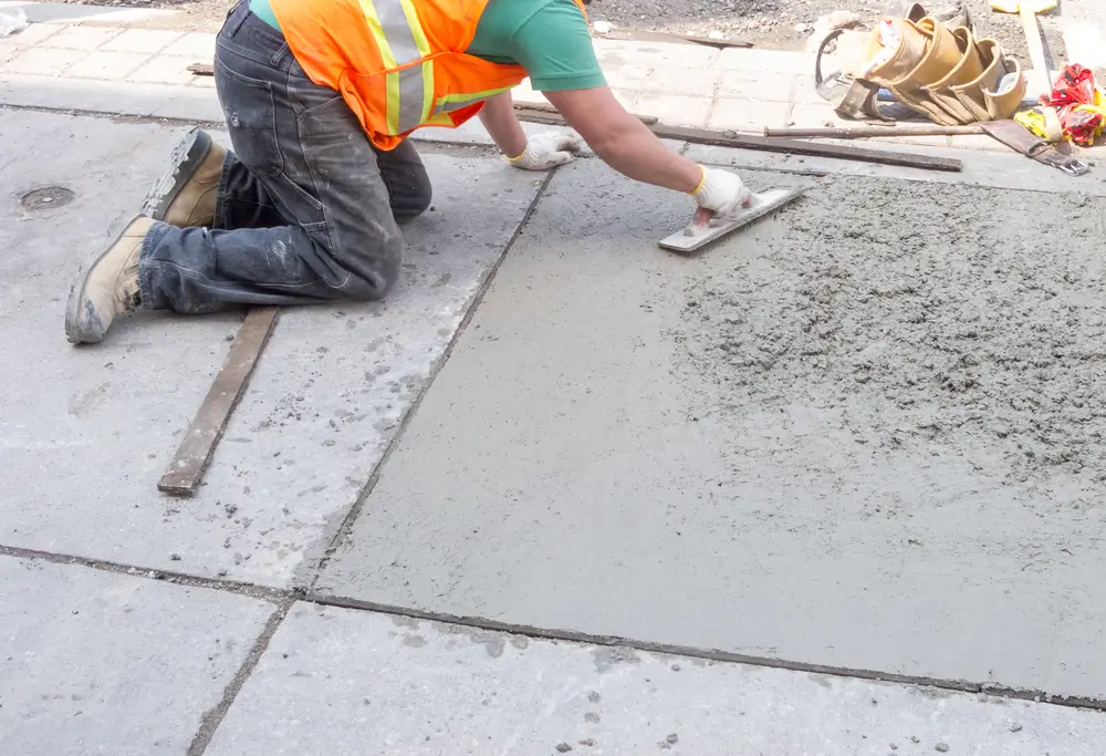 Northland Concrete Services is carrying out concrete relaying on a residential walkway, enhancing its durability and appeal.
