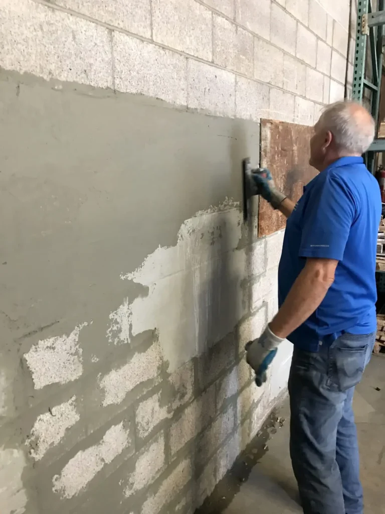 Northland Concrete Services is performing concrete relaying on a sidewalk, ensuring a level and long-lasting walking path.