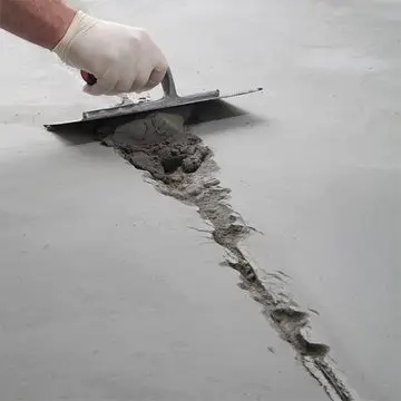 Northland Concrete Services is undertaking concrete relaying on a backyard path, providing a seamless and durable restoration.