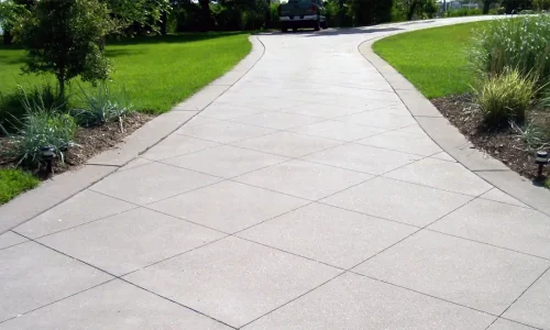 A newly constructed concrete driveways by Northland Concrete Services, designed for durability and a smooth finish. A newly constructed concrete driveways by Northland Concrete Services, designed for durability and a smooth finish.